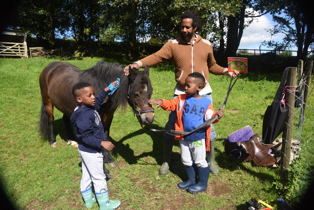 City Children enjoy meeting Rainbow the Pony!